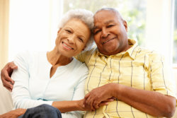 old woman kissing caregiver